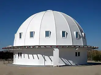 domed white structure in the desert