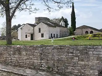 The so-called Treasury (right) and the Church of the Holy Unmercenaries (left)
