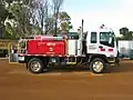 Heavy duty fire appliance Isuzu 550 (HD119 – Cape Le Grand) at Esperance depot, September 2010.