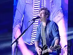 Bourne performing with Busted at Manchester Arena, 2016