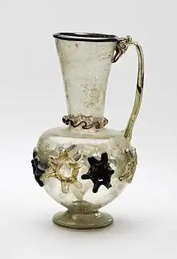 11th or 12th-century jug, blown, trail-decorated and tooled, 18.2 cm tall