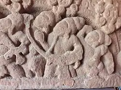 relief sculpture, arched harp