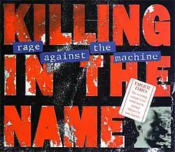 Large red block capitals on black background reads "killing in the name."