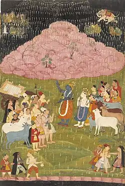 The mountain Govardhan hovers above Krishna and his tribe to protect them from an air attack