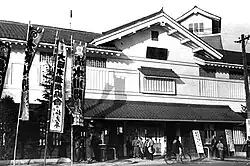 Front door of the arena, nobori flags on the left