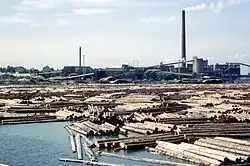 Sawmill with the floating logs in Kotka, Finland