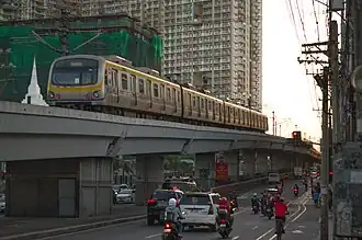LRT-2 Trainset 4 Westbound Aurora Boulevard, Quezon City.jpg