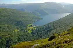 Lakså seen from the hill Tverrstigfjellet. The Laksåga River empties into Lakså Bay.