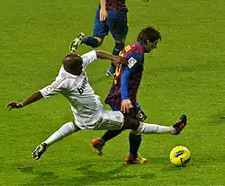 Two players vying for the ball