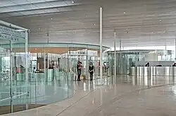 The reception hall with circular glass rooms
