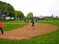 A kickball game at Lillis–Albina Park