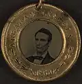 Campaign button for Abraham Lincoln, 1860, on flip side his vice presidential running mate Hannibal Hamlin