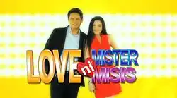 An image of Zoren Legaspi and Carmina Villarroel, over an orange background. The show title is displayed on the center of the image.