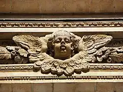 Cherub of the lintel of the front window