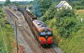 The Asahi liner train passing the closed station at Manulla Junction, 10th August 1985