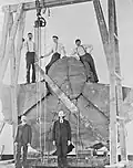 Assembling the trunk section of the Mark Twain Tree for display in New York in 1892