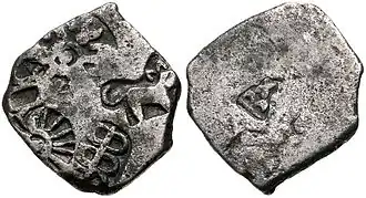 Mauryan coin with arched hill symbol on reverse.[citation needed]