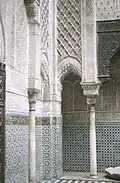 View of the small arches and blind arches (or niches) at the corners of the courtyard which are sculpted with muqarnas