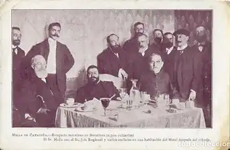 Janer (sitting 1fL) with de Mella