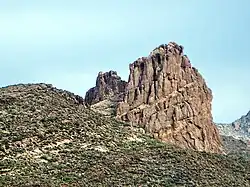 Miners Needle from Bluff Spring Trail. Note prominent bedding planes in the volcanics. (2010)
