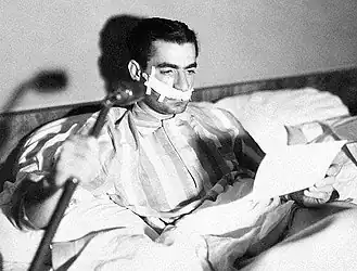 Iranian Shah Mohammad Reza Shah in hospital after the failed assassination attempt by Fada'iyan-e Islam in 1949