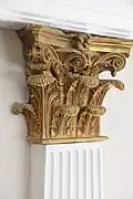 Gold Corinthian capital of a pilaster, in courtroom