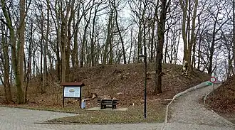 Mound of Mecklenburg Castle with the information board