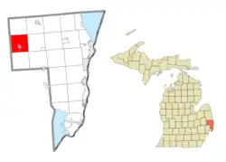 Location within St. Clair County (red) and the administered village of Capac (pink)