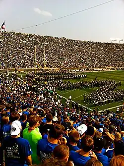 The Band of the Fighting Irish spells out ND through which the Notre Dame Fighting Irish Football Team runs onto the field