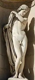Narcissus (1866), by Paul Dubois. On the north façade of the Cour Carrée in the Louvre Palace, Paris.