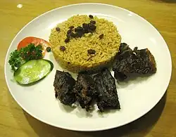 Nasi kebuli with goat meat.
