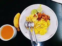 Nasi kuning for breakfast in Indonesia