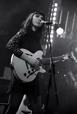 Natalie McCool performing at a show.