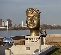 very large sculpture of Nellie Bly's head