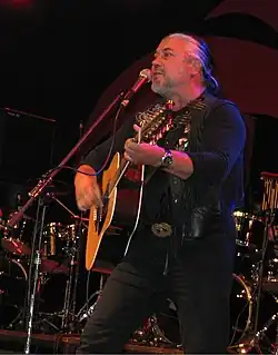 Covaci performing live with Phoenix in 2006