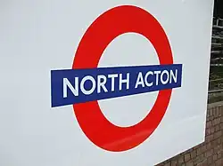Station roundel on westbound platform in May 2008