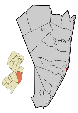Location of Barnegat Light in Ocean County highlighted in red (right). Inset map: Location of Ocean County in New Jersey highlighted in orange (left).