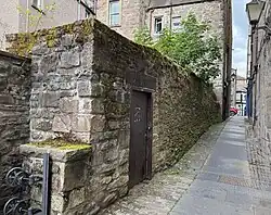 George Inn Lane, beside the hotel, features the last remaining portion of Perth's city walls