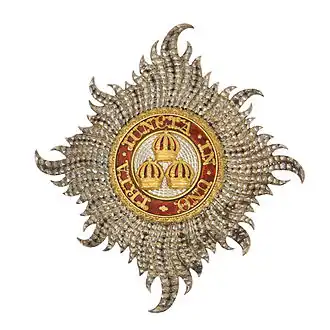 Civil Knight Grand Cross Star of The Most Honourable Order of the Bath: 'Rays of silver issuing from a centre and charged with three Imperial Crowns, one and two, within a circle gules whereon inscribed the motto of the Order in gold'[1]