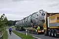 MAN ballast tractor pushing hydraulic modular trailer with bolster configuration.