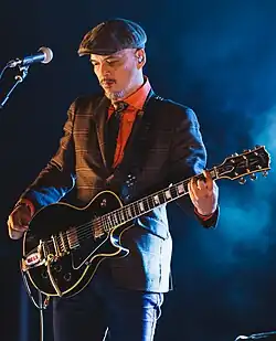 Santiago performing in 2017