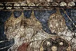 Horsemen with pointed helmet.