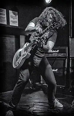 Phil X performing in 2013