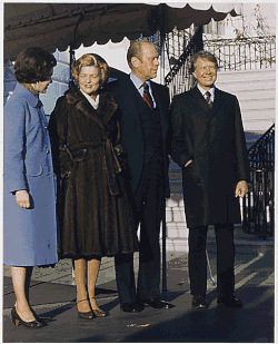The Fords welcome President-elect Jimmy Carter and his wife Rosalynn Carter to the White House on November 22, 1976, during the presidential transition.