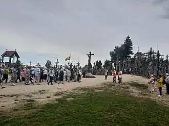 Pilgrims travel to the Hill of crosses