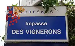 Color photograph of a street name plaque.