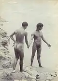 Two youths on shore; right figure possibly Galdi (c. 1900)