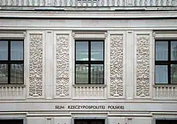 Details carved into white sandstone