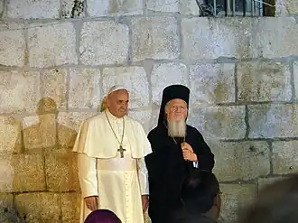 Pope Francis, and Patriarch Bartholomew I in the Church of the Holy Sepulchre, Jerusalem (2014).