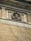Portrait medallion (1906), Herron High School, Indianapolis, Indiana.